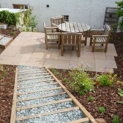 Steps with gravel and seating area garden